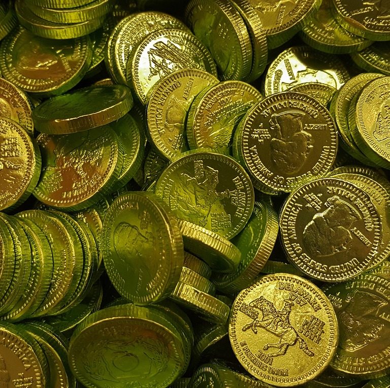 Imagem mostra moedas de ouro que simbolizam ações do tipo golden share