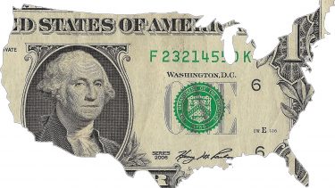 Imagem mostra dólar e chama atenção para a reunião do Fed